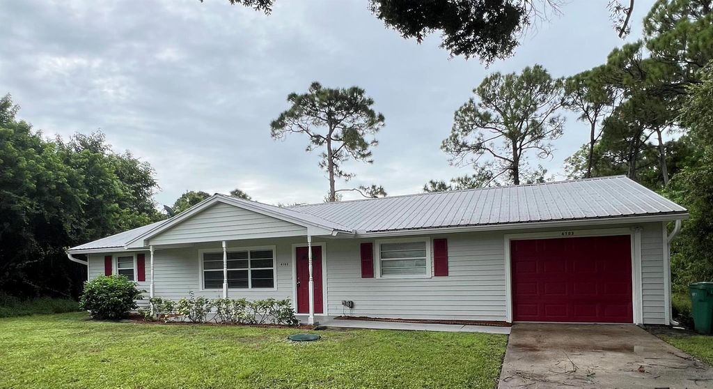 Photo of 6703 Pensacola Road, Fort Pierce, FL 34951 (MLS # R11146603)
