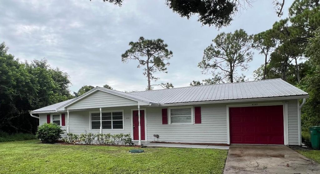 Photo of 6703 Pensacola Road, Fort Pierce, FL 34951 (MLS # R11146603)