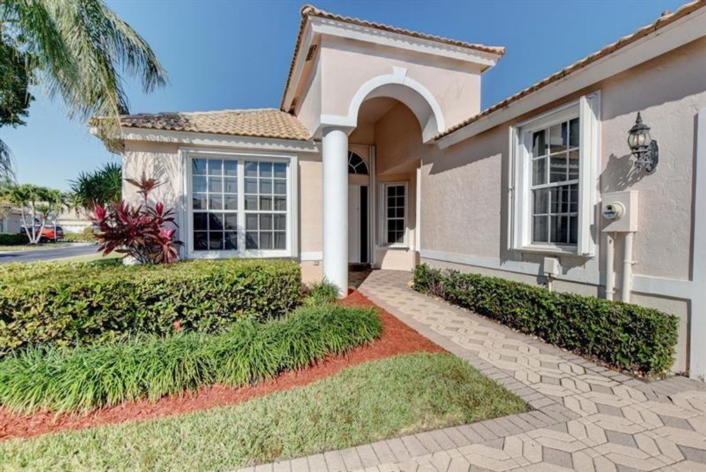 Photo of 9145 Long Lake Palm Drive, Boca Raton, FL 33496 (MLS # F10418594)