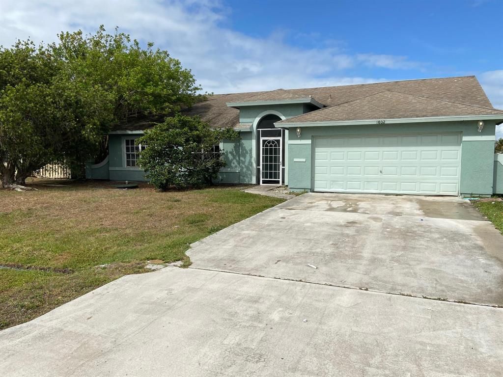 Photo of 1802 SE North Blackwell Drive, Port Saint Lucie, FL 34952 (MLS # R10718313)
