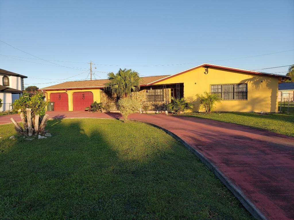 Photo of 733 SW 15th Drive, Belle Glade, FL 33430 (MLS # R11041846)
