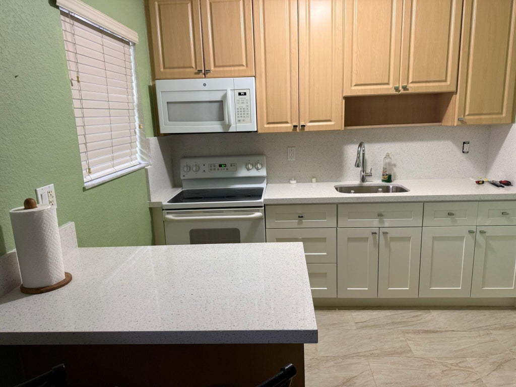 Photo of 110 SE 2ND Street #303, Hallandale Beach, FL 33009 (MLS # B26075361)