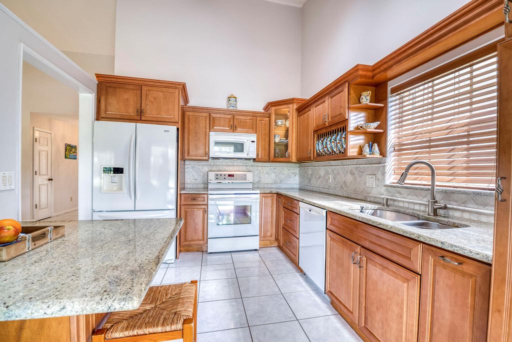 Photo of 306 Moccasin Trail W, Jupiter, FL 33458 (MLS # R10931989)