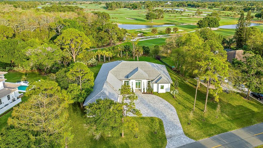 Priced below recent appriasal, this newly built, one-story CBS home offers an exceptional living experience right on the Old Trail golf course. The open floor plan boasts high ceilings and impact windows and doors, blending style with security. The chef-inspired kitchen is a true standout, featuring double islands and stunning waterfall quartz countertopsâ”perfect for entertaining. The thoughtful split floor plan provides privacy, with a spacious primary suite that includes two walk-in closets and a luxurious free-standing tub. Additional features include 3 bedrooms, an office, a formal dining room, and a cabana bath. Enjoy the peace of mind provided by a 24-hour secured gate, a low HOA fee, and optional membership opportunities.  Short-term, low-interest seller financing available.