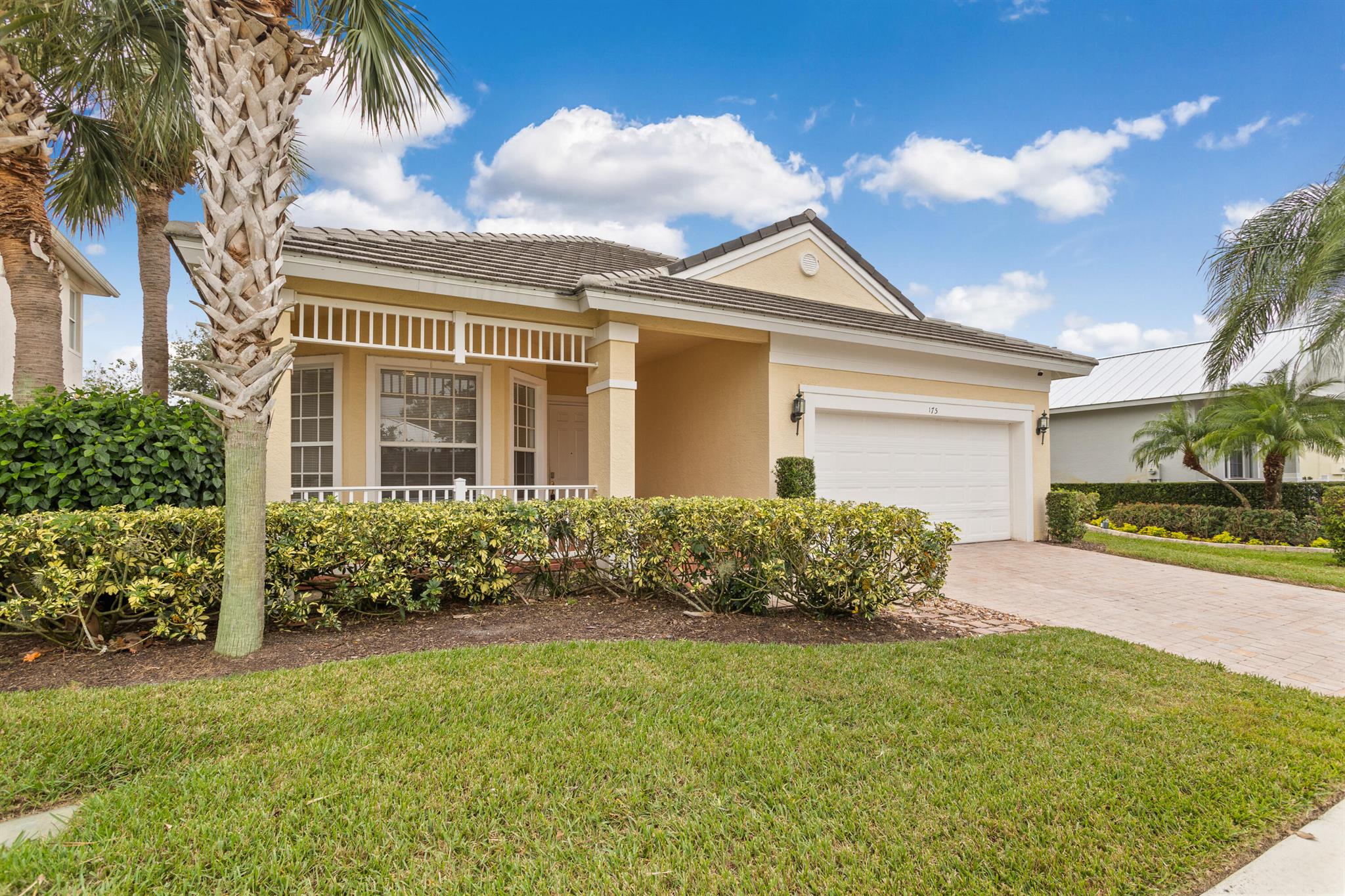 Beautiful 4BR/3BA home in the gated community of Magnolia Lakes with over 2,400 sq ft under air and 3,214 total sq ft. Features include an open split-bedroom layout, stainless steel appliances, luxury vinyl & tile flooring, oversized garage with EV charger, and a screened lanai. Enjoy resort-style amenities: heated pool, kiddie pool, fitness center, clubhouse, tennis, bocce, basketball, and more. Low HOA includes lawn care and irrigation. Close to I-95, shopping, dining, and Tradition. Move in Ready!