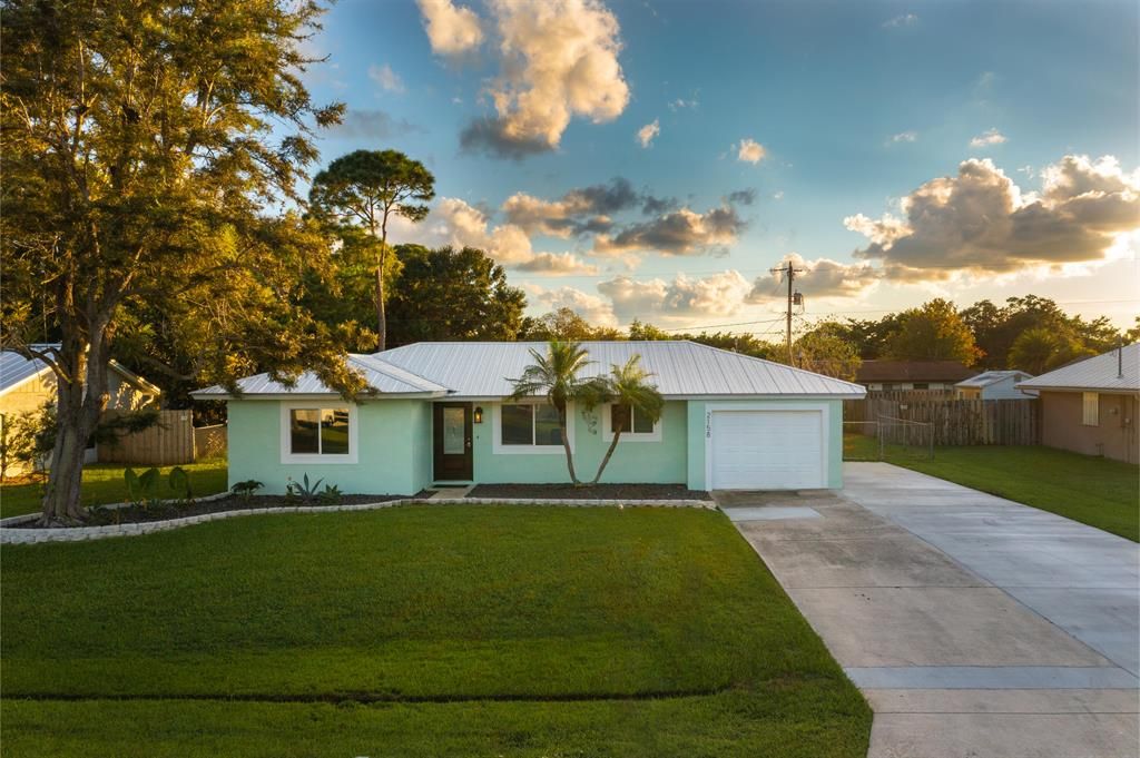 Photo of 2158 SE Bowie Street, Port Saint Lucie, FL 34952 (MLS # R10748633)