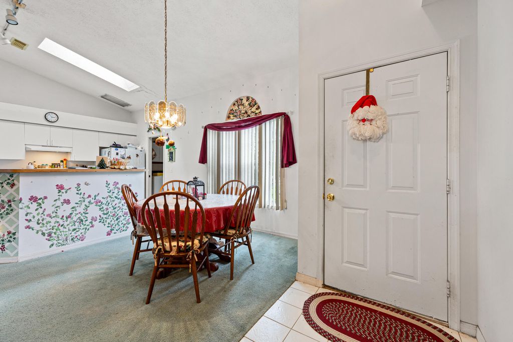 Photo of 941 SW Cairo Avenue, Port Saint Lucie, FL 34953 (MLS # R11006617)