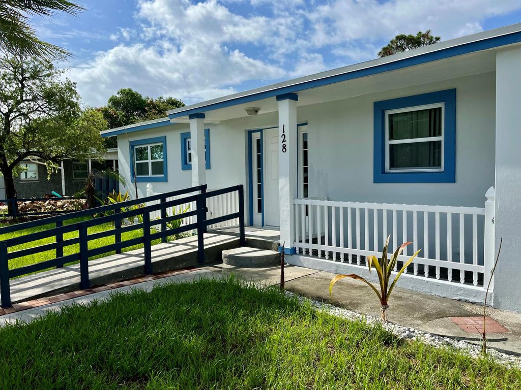 Photo of 128 SE Prima Vista Boulevard, Port Saint Lucie, FL 34983 (MLS # R10998194)