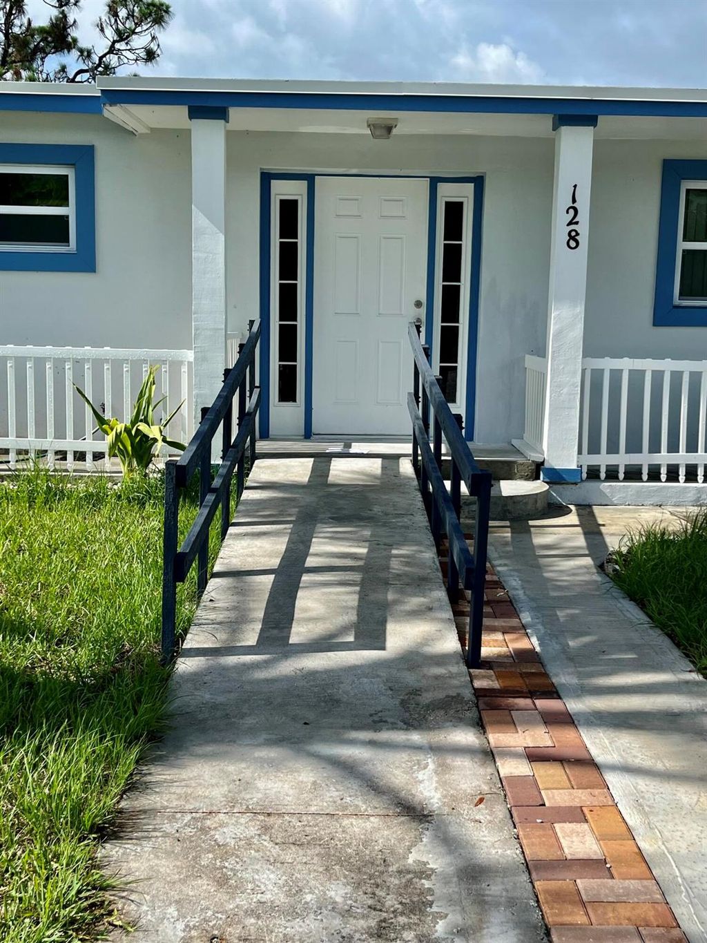 Photo of 128 SE Prima Vista Boulevard, Port Saint Lucie, FL 34983 (MLS # R10998194)