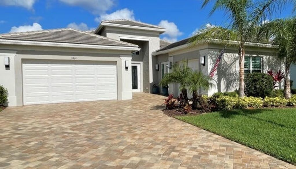 Photo of 11924 SW Marigold Lakes Drive, Port Saint Lucie, FL 34987 (MLS # R10806582)