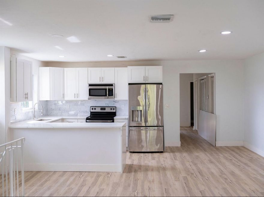 Welcome to Lake Worth Beach living at it finest. This 2 bedroom 1 and a half bathroom, all ages condo ,This second story condo has a loft feel with patio over looking lush landscaping. The kitchen is equipped with stainless steel appliances, including dishwasher and wood cabinetry. It has been freshly painted with beautiful laminate wood flooring throughout. There are  washer and dryer inside the unit. The building is very close to downtown and the beach. Pet friendly. Come by and see what Lake Worth Beach is all about! please. Call or TX .Luis Ramirez  for showing.