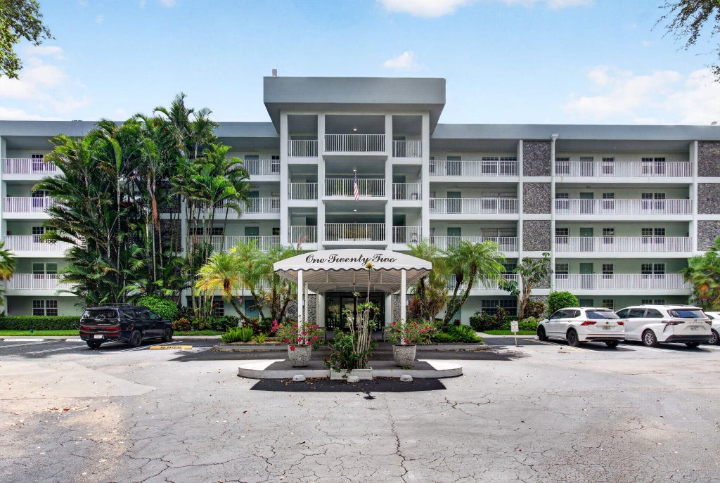 Photo of 802 CYPRESS GROVE Lane #309, Pompano Beach, FL 33069 (MLS # B26069030)