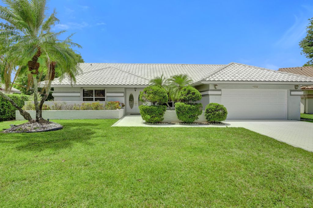 Photo of 9224 Sun Pointe Drive, Boynton Beach, FL 33437 (MLS # B26019587)