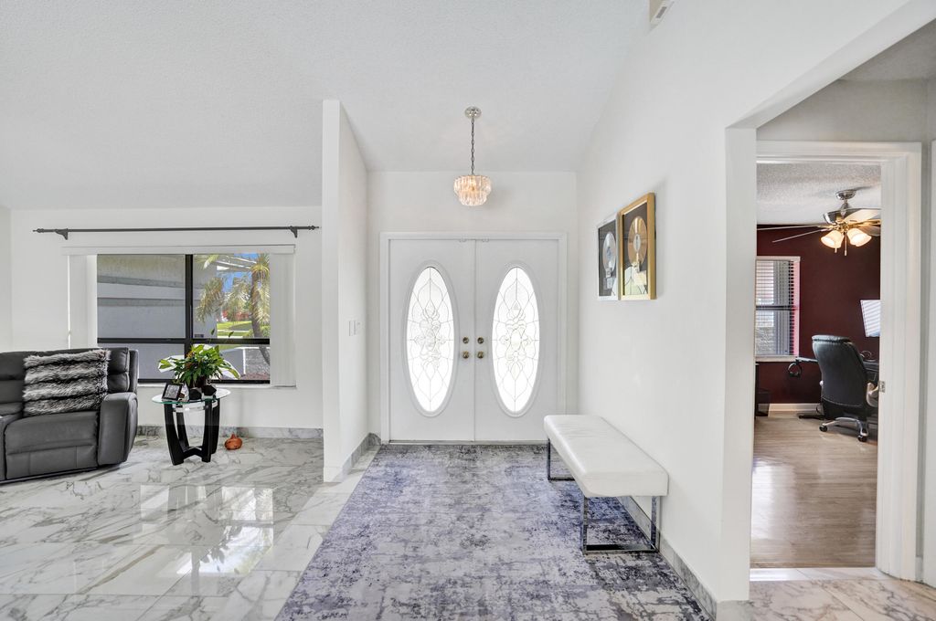 Photo of 9224 Sun Pointe Drive, Boynton Beach, FL 33437 (MLS # B26019587)