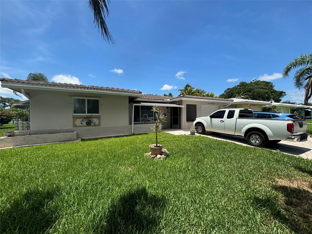 Photo of 4622 NW 45th Ct, Tamarac, FL 33319 (MLS # F10447168)