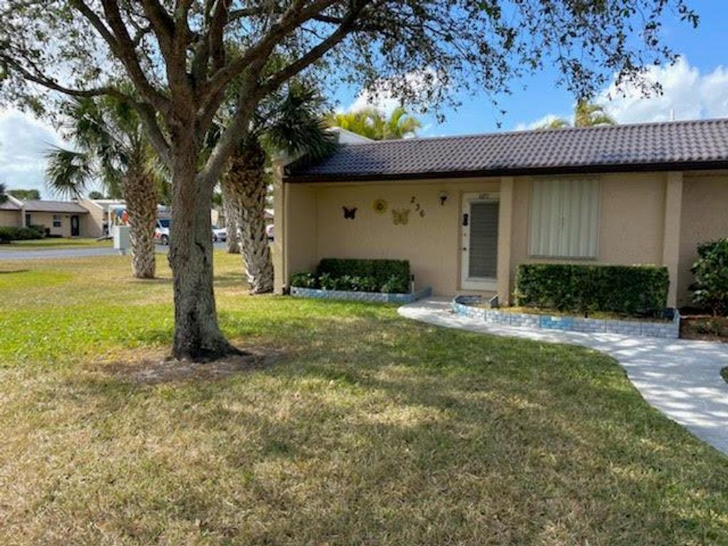 Photo of 236 Lake Meryl Drive, West Palm Beach, FL 33411 (MLS # R10691765)