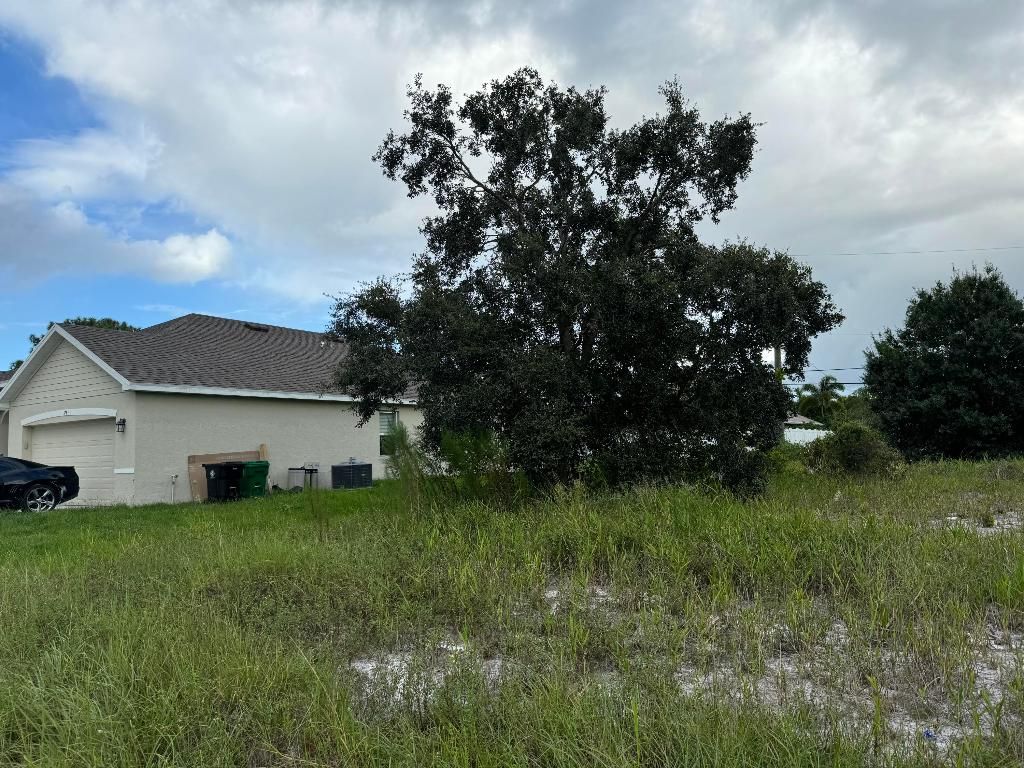 Photo of 3757 SW Port Saint Lucie Boulevard, Port Saint Lucie, FL 34953 (MLS # R11015804)