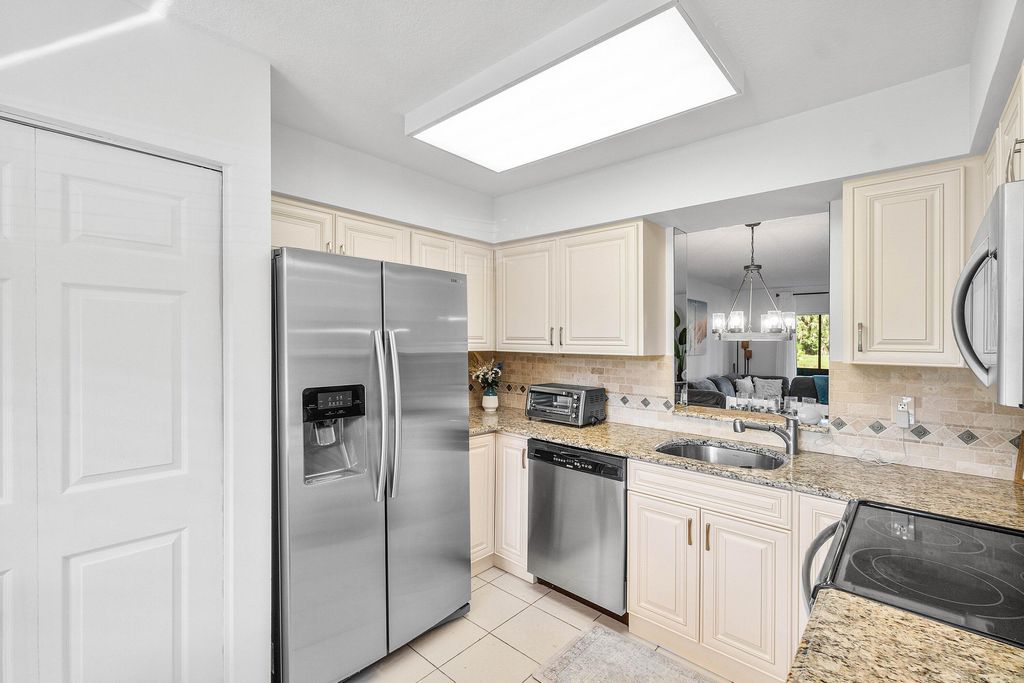 Photo of 7321 Amberly Lane #108, Delray Beach, FL 33446 (MLS # B26019888)