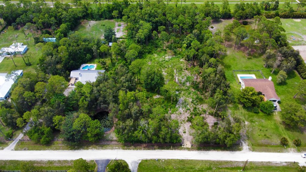 Photo of 13133 159th Street N, Jupiter, FL 33478 (MLS # B26009530)