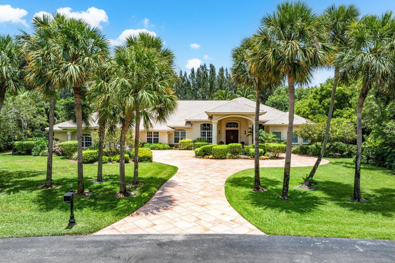 Luxurious 6-bed, 6.1-bath custom estate including an attached guest house. This nearly 6,300 SF single-story home is situated on a 1-acre lot within the secure, guard-gated Foxe Chase community. Just minutes from the vibrant downtown Delray Beach--a highly desirable small beach town boasting one of the nation's top-rated beaches--this property offers an ideal blend of privacy and accessibility. Zoned for the acclaimed Omni Middle and Spanish River High Schools in Boca Raton, it ensures top-tier education options. The expansive layout features a lavish primary suite with a cozy sitting area and spa-inspired bathroom, while the attached 2-bed/2-bath guest house includes its own living space, kitchenette, and tranquil Japanese garden.