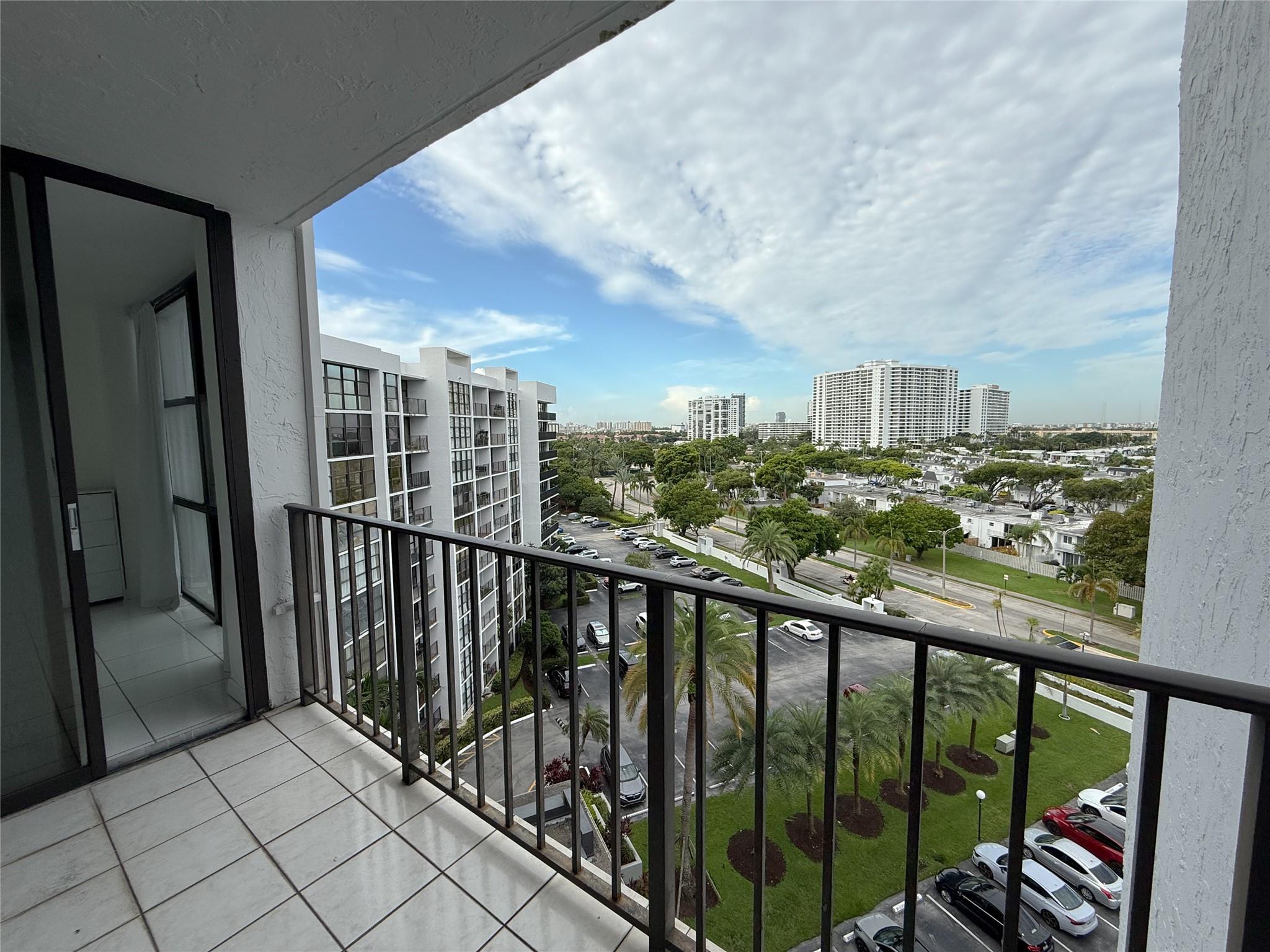 Welcome home, live life from the ninth floor and minutes from the beach. Experience the perfect blend of comfort and convenience in this light and airy condo featuring floor to ceiling windows that flood the space with natural light. Newly tinted windows. The versatile second room can serve as a cozy bedroom or a functional home office. Step outside onto your private balcony and take in the sweeping views of the city skyline and surrounding area. Enjoy resort like amenities including a heated pool by the marina, tennis courts and a fully equipped fitness center. Each floor offers a convenient laundry room by the elevators. Rent includes water, basic cable and internet. One assigned parking spot close to the building. 700 credit score required by association.