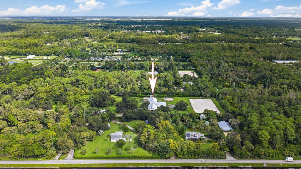 Photo of 14339 Collecting Canal Road, Loxahatchee Groves, FL 33470 (MLS # R11158365)