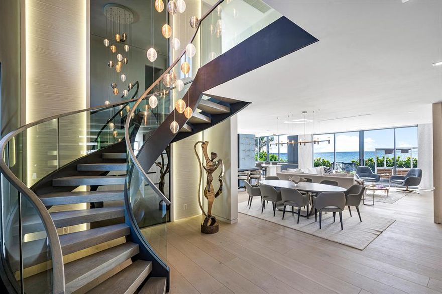 Located on an ultra-private street in one of the most sought-after areas of Ocean Ridge, 6029 Old Ocean Blvd. is sited on 80' of direct oceanfront featuring 4,700 total luxurious square feet. Designed by renowned architect Randal Stofft the home, exquisitely is framed to capture unrivaled ocean views and breathtaking sunrises from virtually every room and is the epitome of oceanfront living at it's best. Completely rebuilt in 2019 using the finest finishes sourced from around the world the warm yet chic modern style residence offers 5 bedrooms 5.1 bathrooms in the main house, two separate garages and a detached guesthouse with full bath. The private courtyard entry creates just the right atmosphere for welcoming family and guests and cozy sunset entertaining. Inspired by the ocean, the view-focused living dining room, designed for relaxed and refined modern living offers floor to ceiling windows and doors, which bath the interior with abundant light. Elegantly styled and outfitted for culinary pursuits, the kitchen includes top shelf appliances and a beautiful island for casual dining and prep space for the chef in the family. The first floor master suite is a peaceful aerie retreat where the owner can enjoy the sights and sounds of the Atlantic Ocean. The sumptuous Zen like bathroom features custom design cabinets with separate tub and shower spaciously designed closets. Upstairs you will find four guest suites with ocean views and private balconies. The grounds offer swaths of lush lawn and tropical landscape, a saltwater pool sunken Jacuzzi, out-door shower, all possessing a seductive pull to unwind and enjoy the col ocean breezes. Close to Atlantic Avenue and the many attractions, the Palm Beaches offer. Connoisseurs the world over will covet this rare oceanfront home.