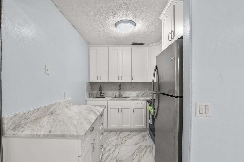 Photo of 63 Hastings D, West Palm Beach, FL 33417 (MLS # B26023666)