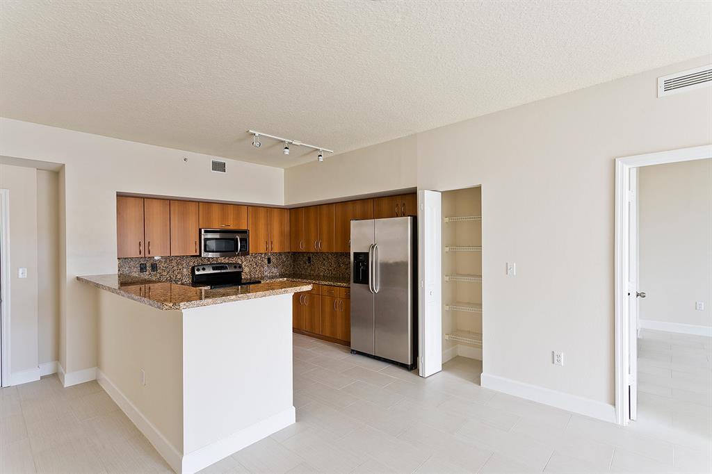 PINEAPPLE GROVE VILLAGE CONDO - Residential