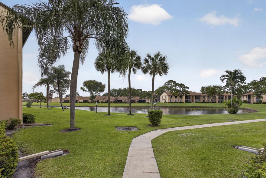 Enjoy peaceful lake views from this condo w/ living/dining room combo. Relax on the screened patio while taking in the serene lake setting. Kitchen offers a convenient pass-through space to dining area—perfect for entertaining or adding bar seating—along w/ Samsung range/refrigerator, stainless steel sink, and pantry. Tile floors throughout living areas, & stackable washer/dryer in hallway closet. AC 20, water heater 23. Rood 2014. Main suite features walk-in closet, walk-in shower negotiable furniture. Pine Ridge North Village IV 55+ requirs 1 occupant 55+; no permanent residents under 35. Application fee $150 pp (non-refundable). 1 pet to 25 lbs. No commercial vehicles, trucks, boats, trailers, motor/mobile homes, campers' recreational vehicles, etc, can park overnight. 1 space,2 car max