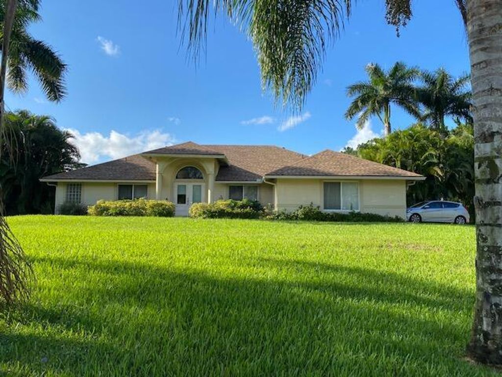 Photo of 14575 92nd Court N, The Acreage, FL 33412 (MLS # R10863356)