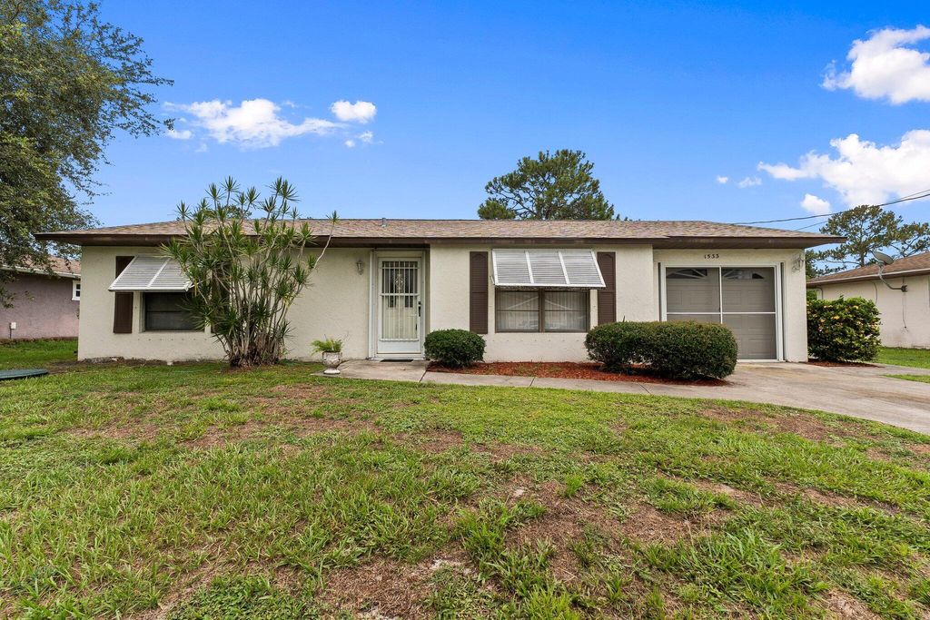 Photo of 1533 SW Hutchins Street, Port Saint Lucie, FL 34983 (MLS # R11104141)