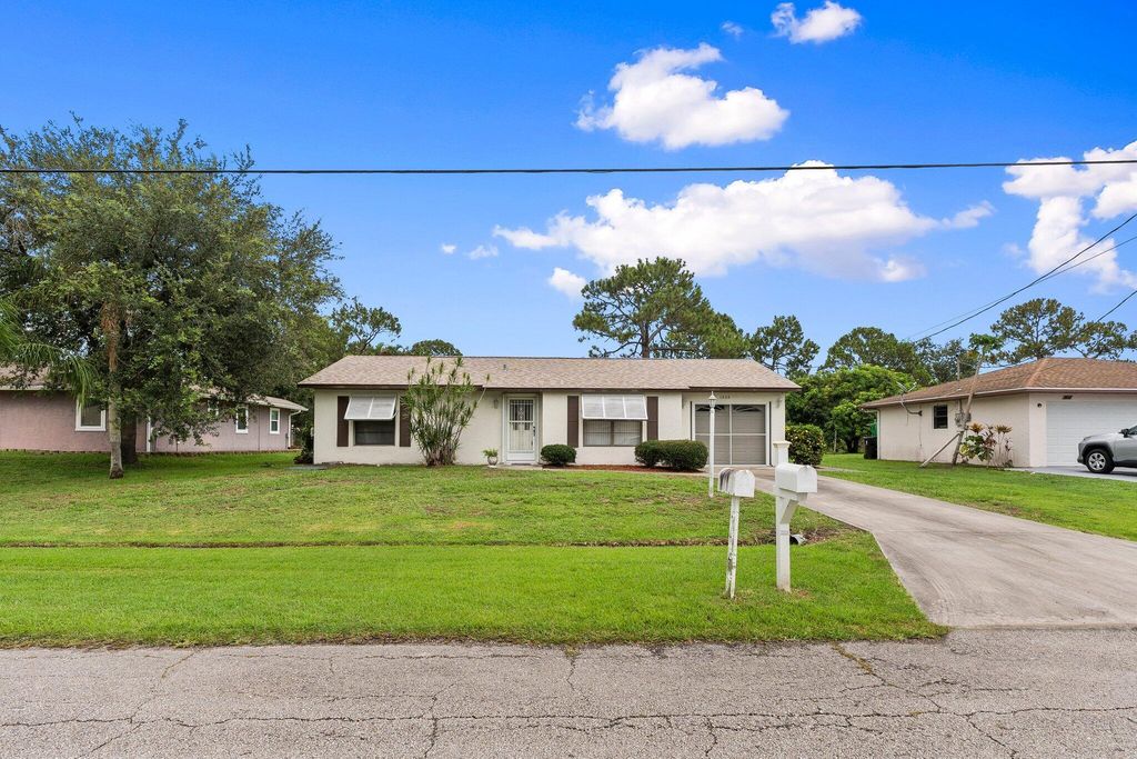 Photo of 1533 SW Hutchins Street, Port Saint Lucie, FL 34983 (MLS # R11104141)