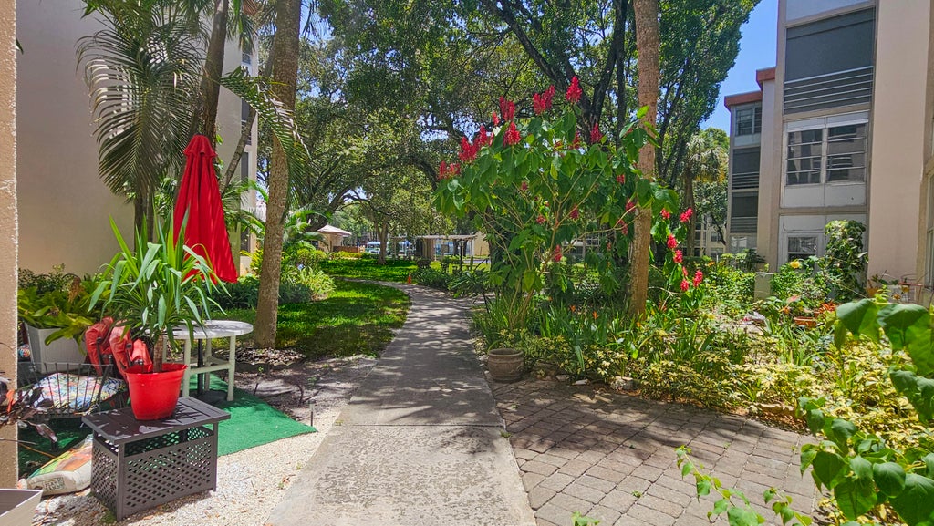 Photo of 2650 NW 49th Avenue #318, Lauderdale Lakes, FL 33313 (MLS # B26072971)
