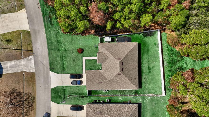 WELCOME TO THIS BEAUTIFULLY BUILT 2022 SINGLE FAMILY RESIDENCE OFFERING 4 BEDROOMS,3 FULL BATHS, A 2-CAR GARAGE,AND A 4 CAR DRIVEWAY. ,PERFECTLY POSITIONED ON A PRIVATE PRESERVE LOT COMPLETE WITH A NEW 6 FOOT WHITE PRIVACY FENCE.WITH 2265 SQUARE FEET OF LIVING SPACE(3100 TOTAL)THIS THOUGHTFULLY DESIGNED 3 WAY SPLIT HOME INCLUDES A FLEX ROOM, ADDING TO THE SPACIOUS AND FUNCTIONAL LAYOUT IDEAL FOR BOTH EVERYDAY LIVING AND ENTERTAINING AND THERE IS NO HOA TO WORRY ABOUT! BRIGHT OPEN KITCHEN WITH AMPLE 36 INCH CABINETRY,SLEEK STAINLESS STEEL APPLIANCES,AND A CONVENIENT BREAKFAST BAR AND BREAKFAST NOOK. OPEN CONCEPT LIVING AND DINING SPACES ARE PEFECT FOR FAMILIES AND GUESTS.TASTEFULLY UPDATED WITH MODERN FINISHES THROUGHOUT INCLUDING HIGH CEILINGS AND LARGE WINDOWS THAT ALLOW NATURAL LIGHT TO  FLOOD THE SPACE. THE EXPANSIVE PRIMARY SUITE INCLUDES DUAL WALK-IN CLOSETS, SEPARATE HIS AND HERS VANITIES, AND A LUXURIOUS SPA-LIKE BATHROOM FEATURING A LARGE SOAKING TUB AND AN OVERSIZED SEPARATE SHOWER. THE MODERN GREAT ROOM IS THE CENTER OF THE HOME, AND IT ADJOINS THE FORMAL DINING AREA AND UTILITARIAN FLEX ROOM WHICH CAN BE USED AS A DEN, OFFICE, OR SITTING ROOM. A SPACIOUS DOUBLE CAR GARAGE INCLUDES A MINI SPLIT A/C FOR YOUR COMFORT AND CEILING RACKS FOR EXTRA STORAGE. THE OWNER IS GRACIOUSLY INCLUDING THE BRINKS ALARM SYSTEM WITH SENSORS ON ALL WINDOWS AND DOORS, AS WELL AS 10 SWANN SECURITY CAMERAS WITH A DVR. THE LONG COVERED PATIO OVERLOOKS THE TRANQUIL YARD WITH LUSH GREENERY,  SERENE VIEWS OF THE PRESERVE, AND NO REAR NEIGHBORS. NESTLED IN A QUIET, FAMILY FRIENDLY NEIGHBORHOOD WITH EASY ACCESS TO LOCAL SCHOOLS, SHOPPING, AND MAJOR HIGHWAYS. LOCATED JUST MINUTES FROM THE AREA'S LARGEST COMMUNITY PARK, AND CLOSE TO CLOVER PARK, THE SPRING TRAINING HOME OF THE NEW YORK METS, THIS HOME OFFERS THE PERFECT BALANCE OF PRIVACY AND ACCESSABILITY. WHILE YOU LIVE APART FROM THE HUSTLE AND BUSTLE, YOU ARE VERY NEAR RESTAURANTS, SHOPPING CENTERS, ENTERTAINMENT, BEACHES, AND GOLF COURSES. YOUR PUBLIX IS THE PUBLIX AT SAINT ANDREWS, ALONGSIDE PNC BANK, A NAIL SALON, CUBAN RESTAURANT, MCDONALDS, DUNKIN DONUTS, SUBWAY, AND A DOLLAR STORE. THE POPULAR TRADITION ALSO AWAITS YOU, WITH ALL TYPES OF EVENTS , FARMER'S MARKETS, RESTAURANTS AND FACILITIES. CULTURAL ATTRACTIONS INCLUDE THE BOTANICAL GARDENS AND WILDLIFE CENTER. DON'T MISS THIS OPPORTUNITY TO OWN A NEWER CONSTRUCTION HOME IN A PRIME AND GROWING LOCATION WHERE YOU CAN LIVE AS PEACEFULLY OR ACTIVELY AS YOU WISH,  A CONVENIENT CABANA BATH PROVIDES EASY ACCESS FOR GUESTS AND FUTURE OUTDOOR LIVING ENHANCEMENTS AS ADDING A POOL. TWO BEDROOMS ARE LOCATED NEAR THE CABANA BATH AND THE THIRD IS ON THE OTHER SIDE OF THE KITCHEN, NEXT TO ANOTHER FULL BATH AND THE LAUNDRY ROOM WITH STORAGE. THE SPACIOUS DOUBLE CAR