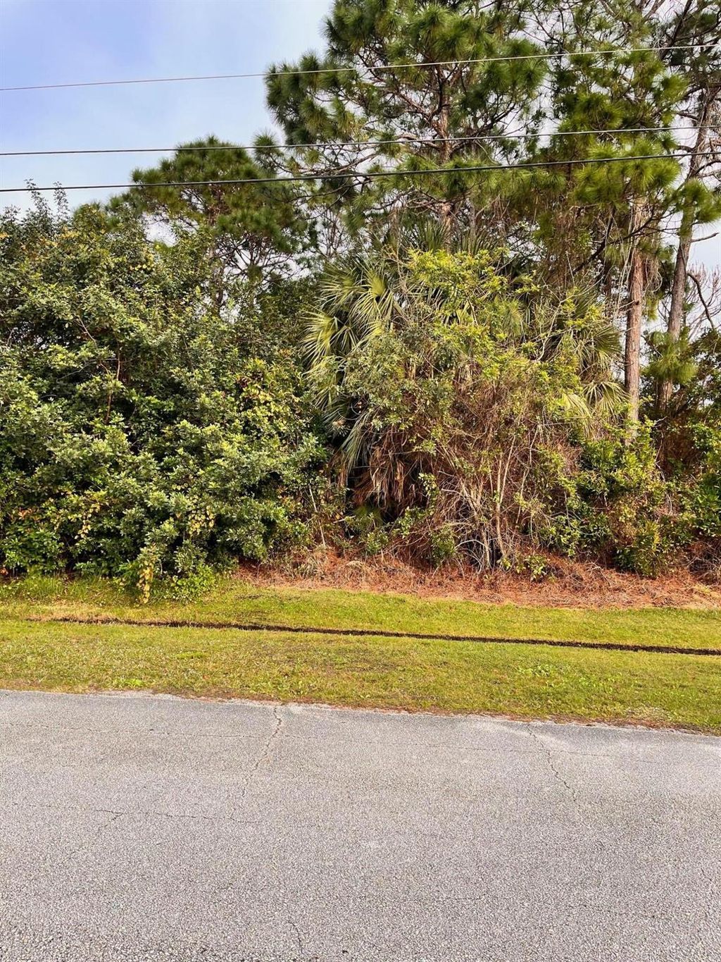 Photo of 5941 NW Center Street, Port Saint Lucie, FL 34986 (MLS # R10947227)