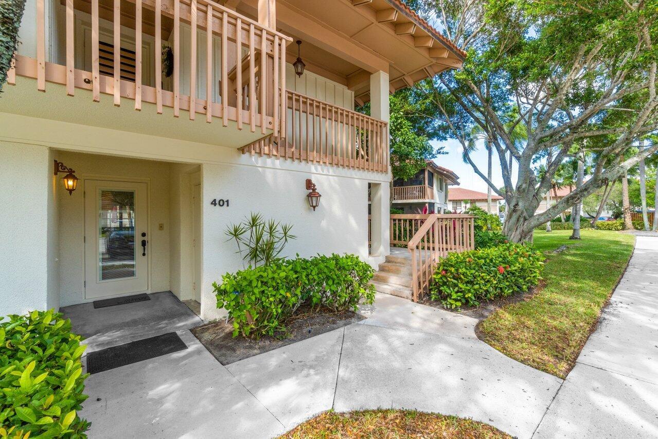 Completely remodeled 2 bed, 2 bath GROUND FLOOR CORNER UNIT at the Golf Villas in PGA National. With 1366 sq. feet under air, this retreat offers the perfect blend of luxury and comfort. Step inside this fully furnished condo and be greeted by the spacious living area featuring luxury vinyl flooring, freshly painted walls and surrounding views of luscious green-scape. The open kitchen features quartz countertops, stainless steel appliances and farmhouse sink, equipped with all the modern conveniences to bring you the comforts of home. A lot of care and thought has gone into creating a warm and inviting atmosphere throughout the condo with elegant decor and accessories provided for your entertaining and relaxing pleasure. The main bedroom suit