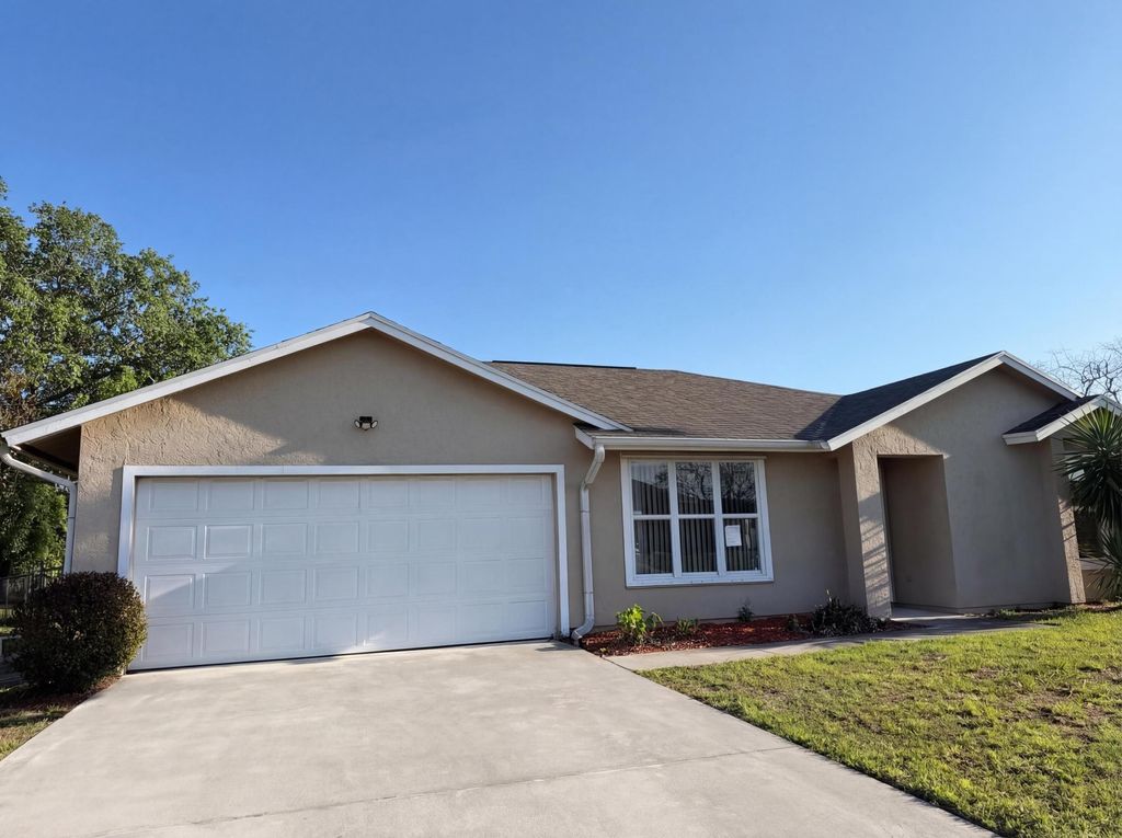 Photo of 681 SW Mccoy Avenue, Port Saint Lucie, FL 34953 (MLS # R11163957)
