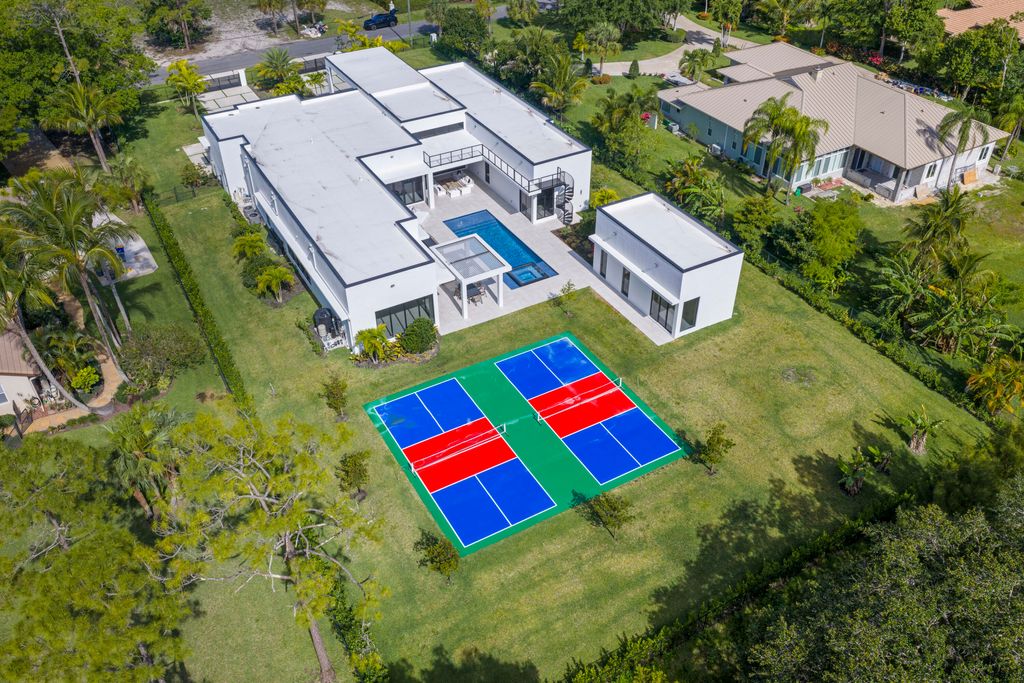 Photo of 6676 NW 66th Way, Parkland, FL 33067 (MLS # B26047704)