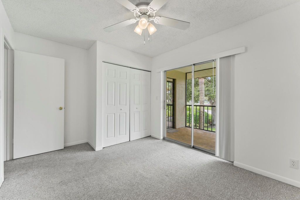 Photo of 6543 Chasewood Drive #E, Jupiter, FL 33458 (MLS # R11028736)