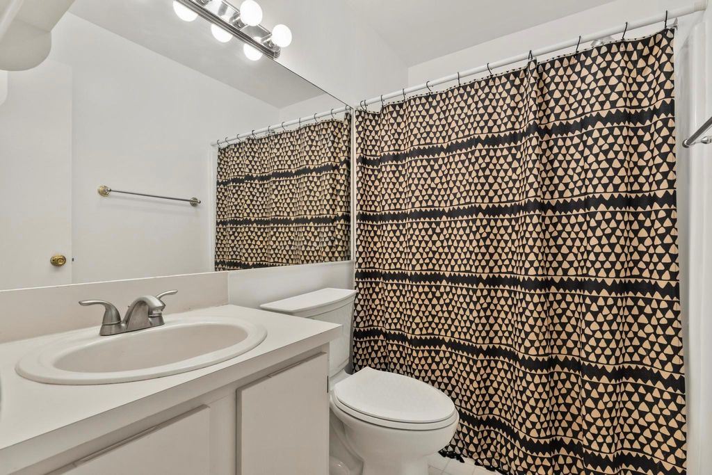 Photo of 6543 Chasewood Drive #E, Jupiter, FL 33458 (MLS # R11028736)