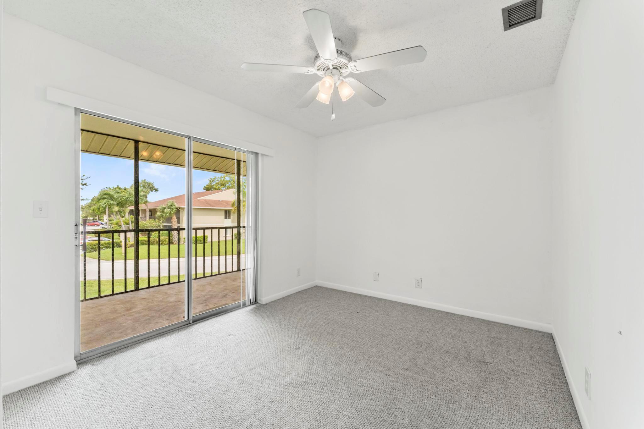 Welcome to this lovely 2-bedroom, 2-bathroom corner unit with vaulted ceilings that create an open and airy ambiance. The open-concept kitchen features white cabinets, quartz countertops, and stainless-steel appliances. The spacious primary bedroom includes a walk-in closet and an en-suite bathroom with a walk-in shower. Enjoy the fresh air on the screened patio or take advantage of the community pool and clubhouse right next door. Plus, owners can rent out this unit immediately, making it perfect for easy and flexible living.