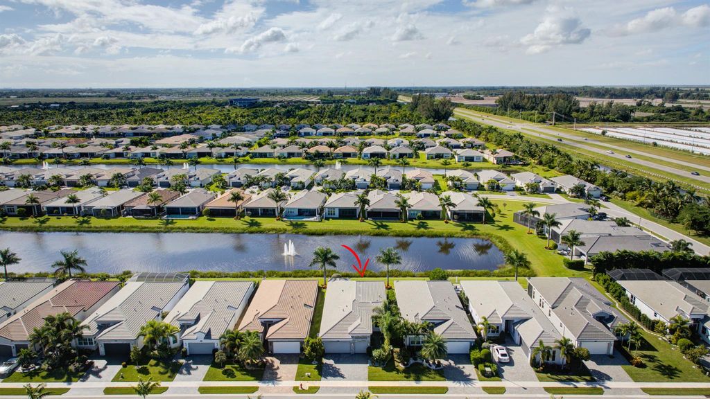 Photo of 9858 Golden Dunes Lane, Boynton Beach, FL 33473 (MLS # R11134412)