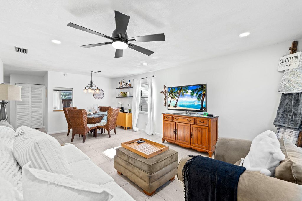 Photo of 40 Seminole Court E, Royal Palm Beach, FL 33411 (MLS # R11161639)