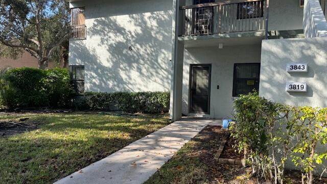 Move right into this updated and renovated, immaculate 2 bed/2bath end unit condo. Located in the desirable Karanda Village IV, this condo features beautiful large tile flooring throughout. Spacious living room and dining area with recessed lighting and sliders to screened in patio. Updated kitchen with stainless appliances. Two ensuite bedrooms with updated bathrooms, walk -in closets with custom built-ins/shelving and sliders to side yard or patio. Full size washer and dryer. Patio and backyard offer serene water view. This unit is conveniently located across the street from the pool. Fantastic location for commuting, shopping and schools. Don't miss out, this won't last!
