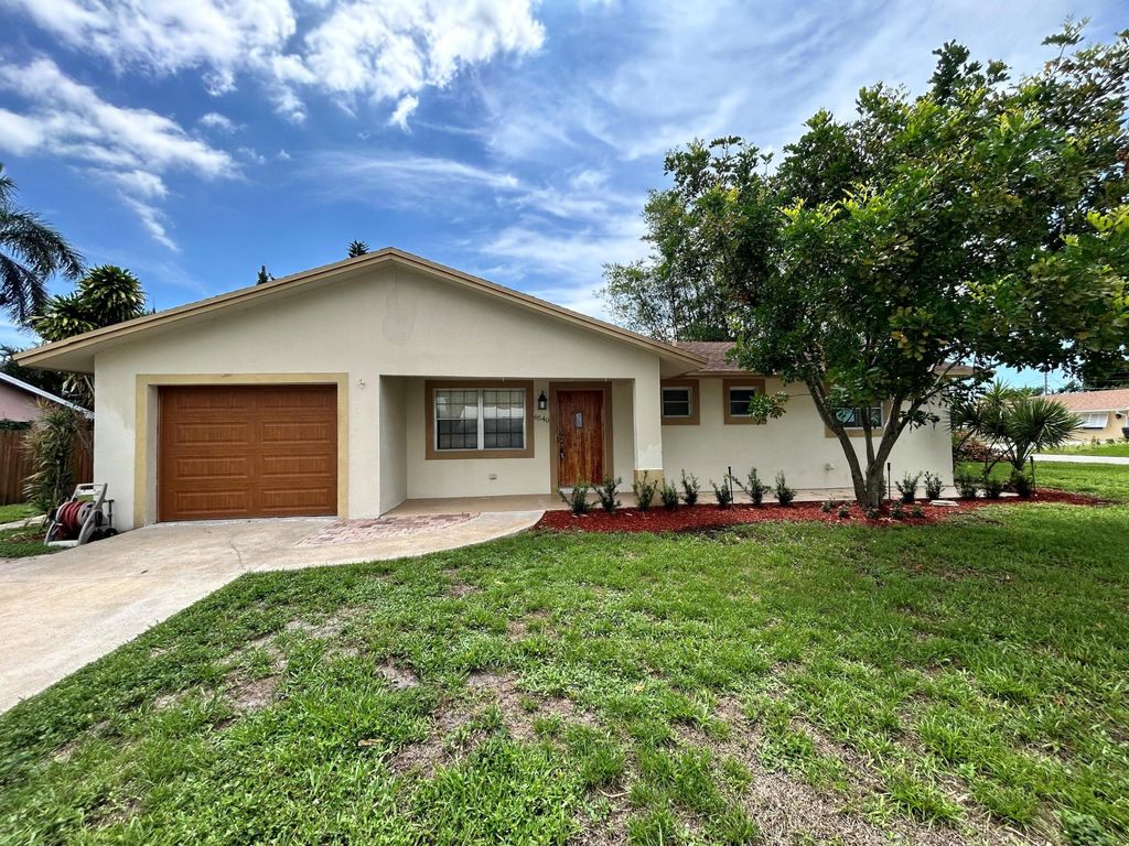 Photo of 6540 Venetian Drive, Lake Worth, FL 33462 (MLS # R10994767)