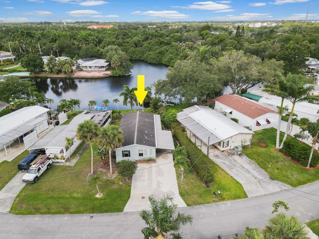 Photo of 7650 SE Fork River Drive, Stuart, FL 34997 (MLS # R10797214)