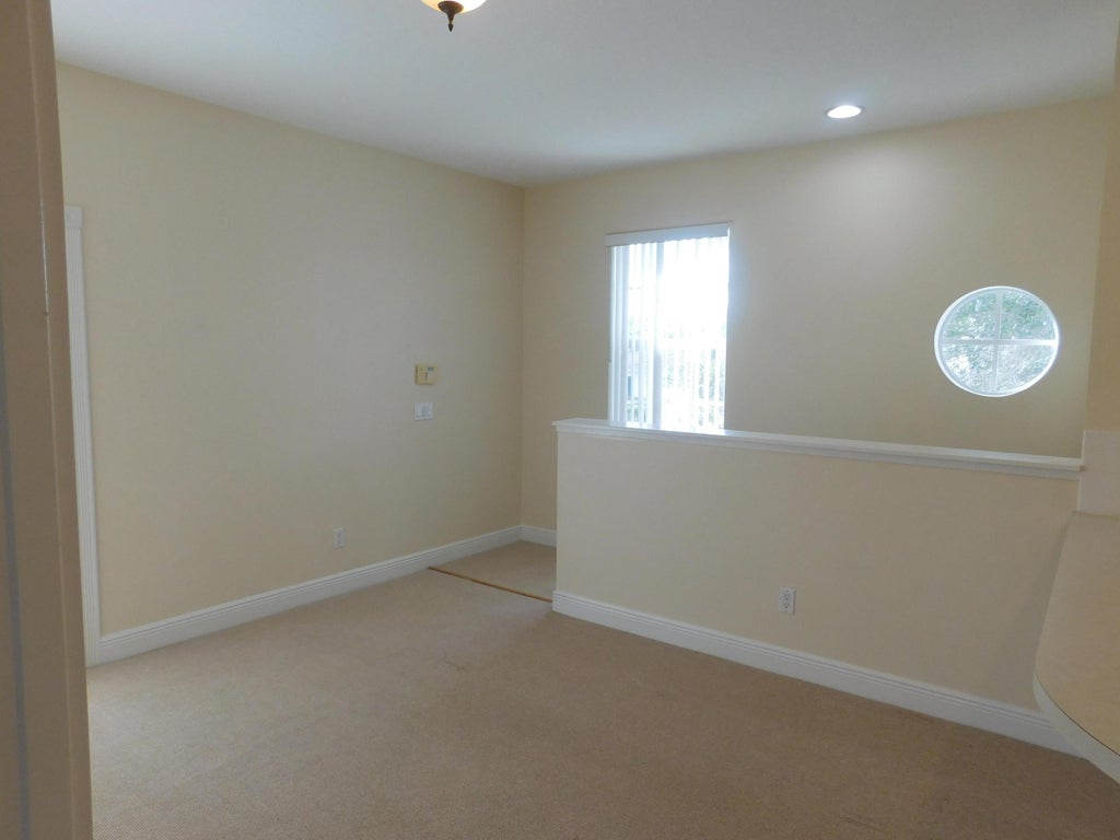 Photo of 4014 Community Drive, Jupiter, FL 33458 (MLS # B26080913)