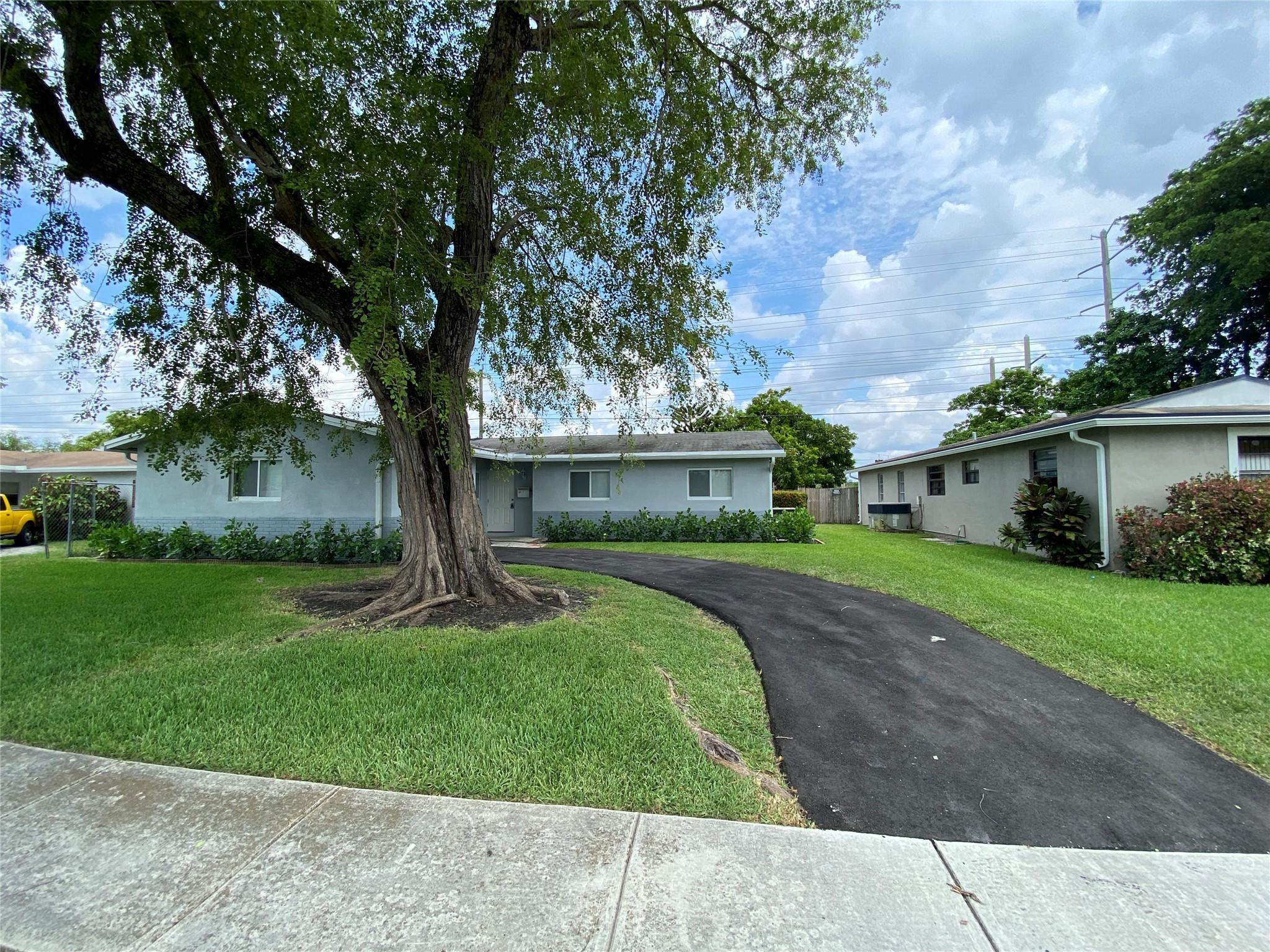 Stunning home with very large kitchen, plenty of cabinetry for storage, quartz counter tops, SS appliances and tile flooring though out. All the bathrooms are updated. This home offers a great room floor plan which makes it great for entertaining.  Fourth bedroom is a full en-suite or can be In-law suite or Nanny suite.  This home also comes with a super large fenced in yard for your children to run free and play. This is a must see...