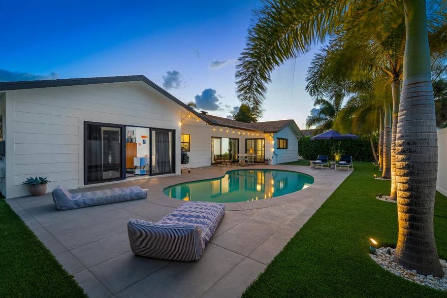 In East Boca Raton's highly sought-after Tunison Palms neighborhood, this remodeled residence presents a polished aesthetic with thoughtfully executed updates throughout. Boasting four bedrooms and 2,380± total square feet, the home features a neutral color palette, plantation-shutter window treatments, and a mix of hardwood and bamboo flooring. The light-filled living room anchors the open-concept floor plan, highlighted by a chic shiplap wall and a wall of sliding glass doors opening to the pool patio, framing serene tropical views. Adjacent, the dining room and renovated kitchen showcase Shaker-style cabinetry, quartz countertops, tile backsplashes, and high-end appliances. The adjoining family room, also with sliding doors to the pool patio, includes a wall closet and could easily function as a guest bedroom. The primary bedroom offers direct pool patio access, while the ensuite bathroom features a split design with a separate vanity area. Completing the layout are two additional guest bedrooms, laundry inside, and a two-car garage. 



DISCLAIMER: Information published or otherwise provided by the listing company and its representatives including but not limited to prices, measurements, square footages, lot sizes, calculations, statistics, and videos are deemed reliable but are not guaranteed and are subject to errors, omissions or changes without notice. All such information should be independently verified by any prospective purchaser or seller. Parties should perform their own due diligence to verify such information prior to a sale or listing. Listing company expressly disclaims any warranty or representation regarding such information. Prices published are either list price, sold price, and/or last asking price. The listing company participates in the Multiple Listing Service and IDX. The properties published as listed and sold are not necessarily exclusive to listing company and may be listed or have sold with other members of the Multiple Listing Service. Transactions where listing company represented both buyers and sellers are calculated as two sales. "No payments made until title passes" Some affiliations may not be applicable to certain geographic areas. If your property is currently listed with another broker, please disregard any solicitation for services. Information published or otherwise provided by seller, listing company or its representatives is deemed reliable but are not guaranteed and subject to errors, omissions, or changes without notice. Copyright 2026 by the listing company. All Rights Reserved.